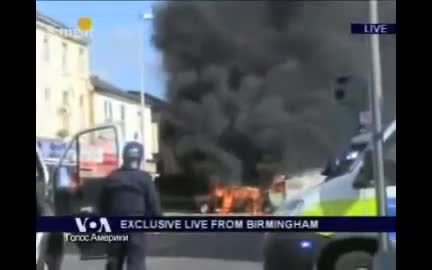 VOA 俄语新闻 · Riots in Manchester and Birminghem (in Russian)